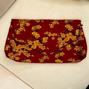 Dries Van Noten Red Brocade/Black Leather envelope clutch, excellent condition.